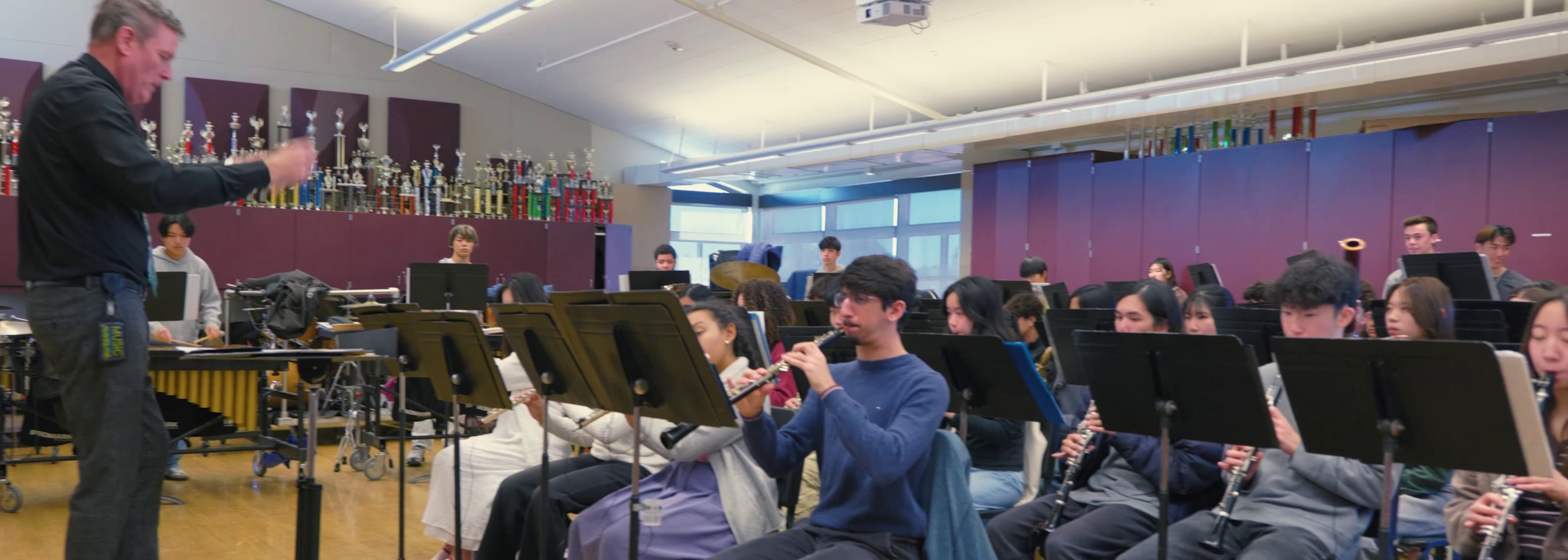 music teacher conducting the class